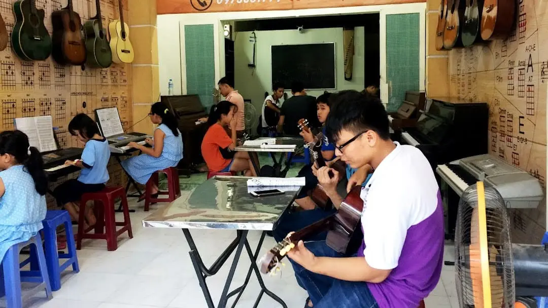 học guitar tphcm Học viện Nốt Trầm